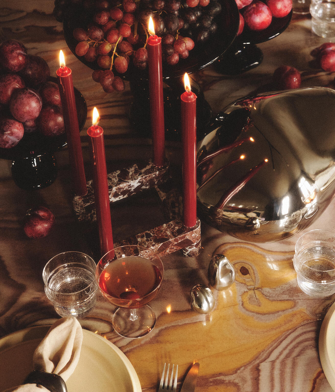 Holiday table setting with candles and decorations